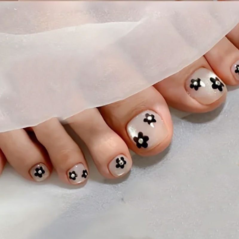 Florale dekorative Pediküre Nagelkunst