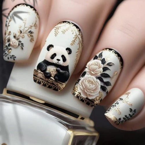 Kunstnägel mit floralem Panda-Motiv Karnz