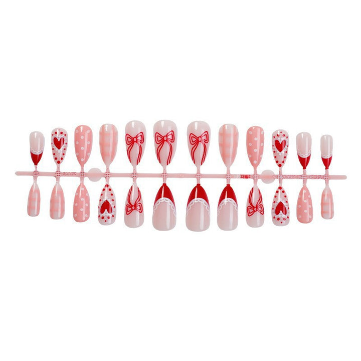 Kreatives Nagelkunst-Set mit romantischen Schleifen-, Herz- und Punkt-Designs Karnz