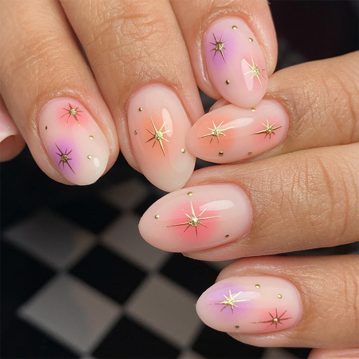 Künstlerischer Press-On Nagelset mit lebhaften Stern-Designs Karnz