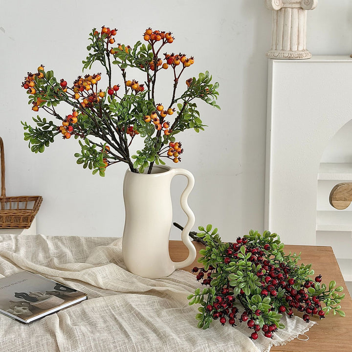 Künstlicher Zweig mit leuchtenden Beeren und Grün Karnz
