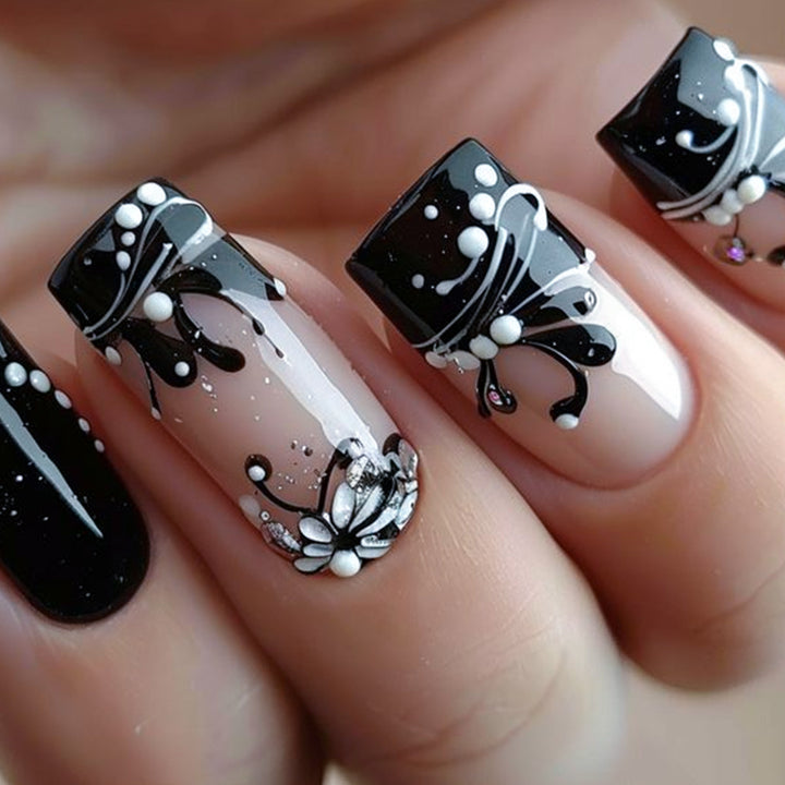 Künstlerisches dekoratives Press-On-Nagelset mit floralem und abstraktem Design