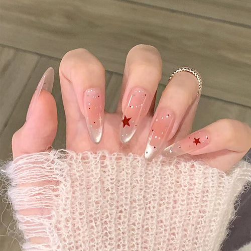 Künstlerisches Press-On-Nagelset mit Stern- und Glitzerelementen Karnz