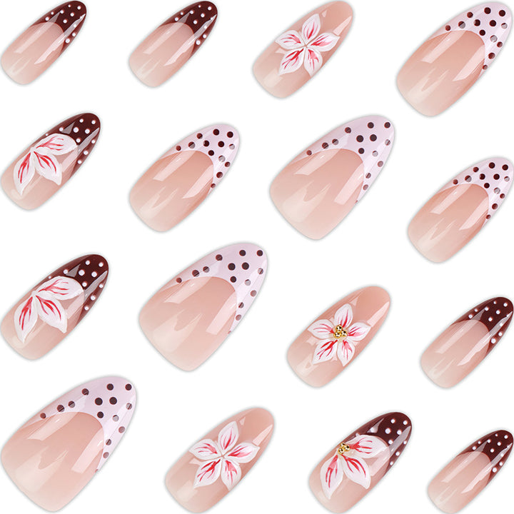 Künstlerische florale Stiletto-Presse-Nägel mit dekorativen Akzenten Karnz
