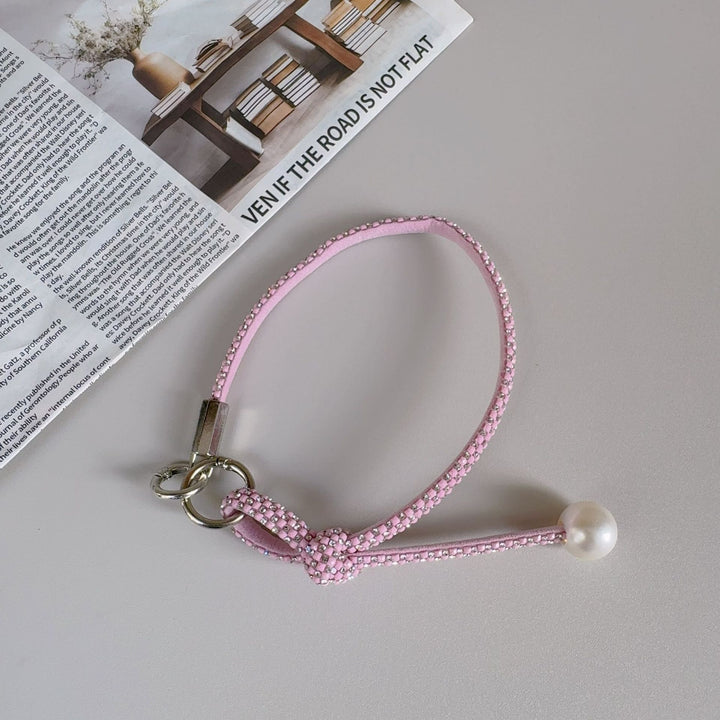 Elegante geknotte Perlenarmband-Band Karnz