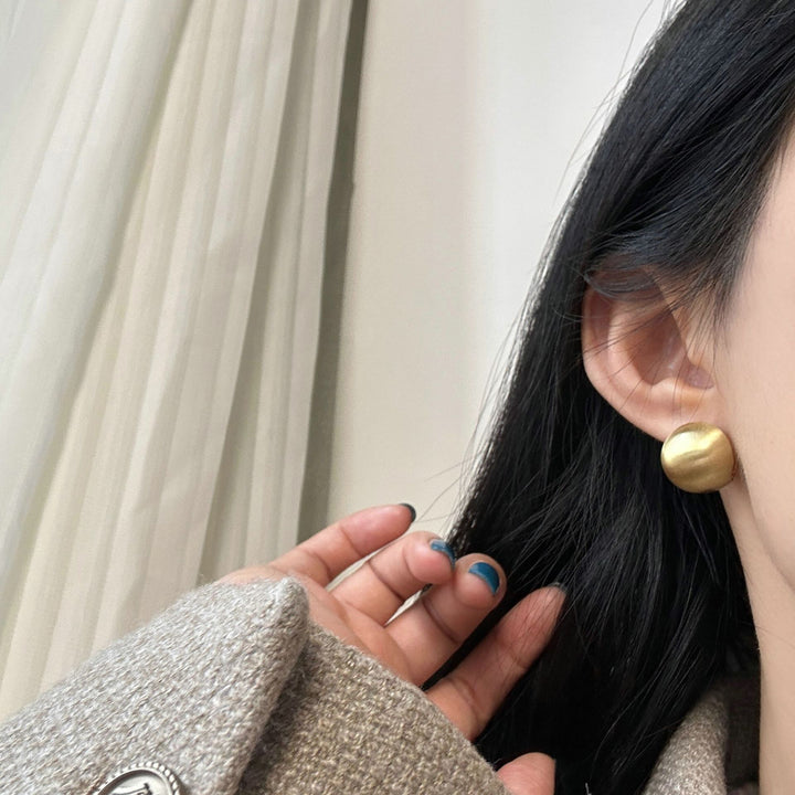 Elegante Ohrstecker Aus Hochglänzendem Metall Karnz