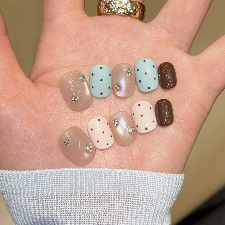Kunstnägel mit Strass und Glitzer Karnz
