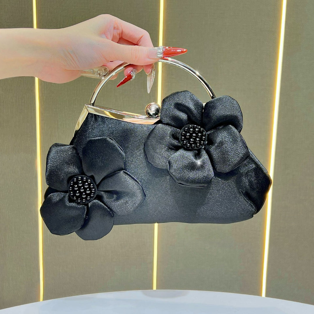 Florale Akzent Clutch