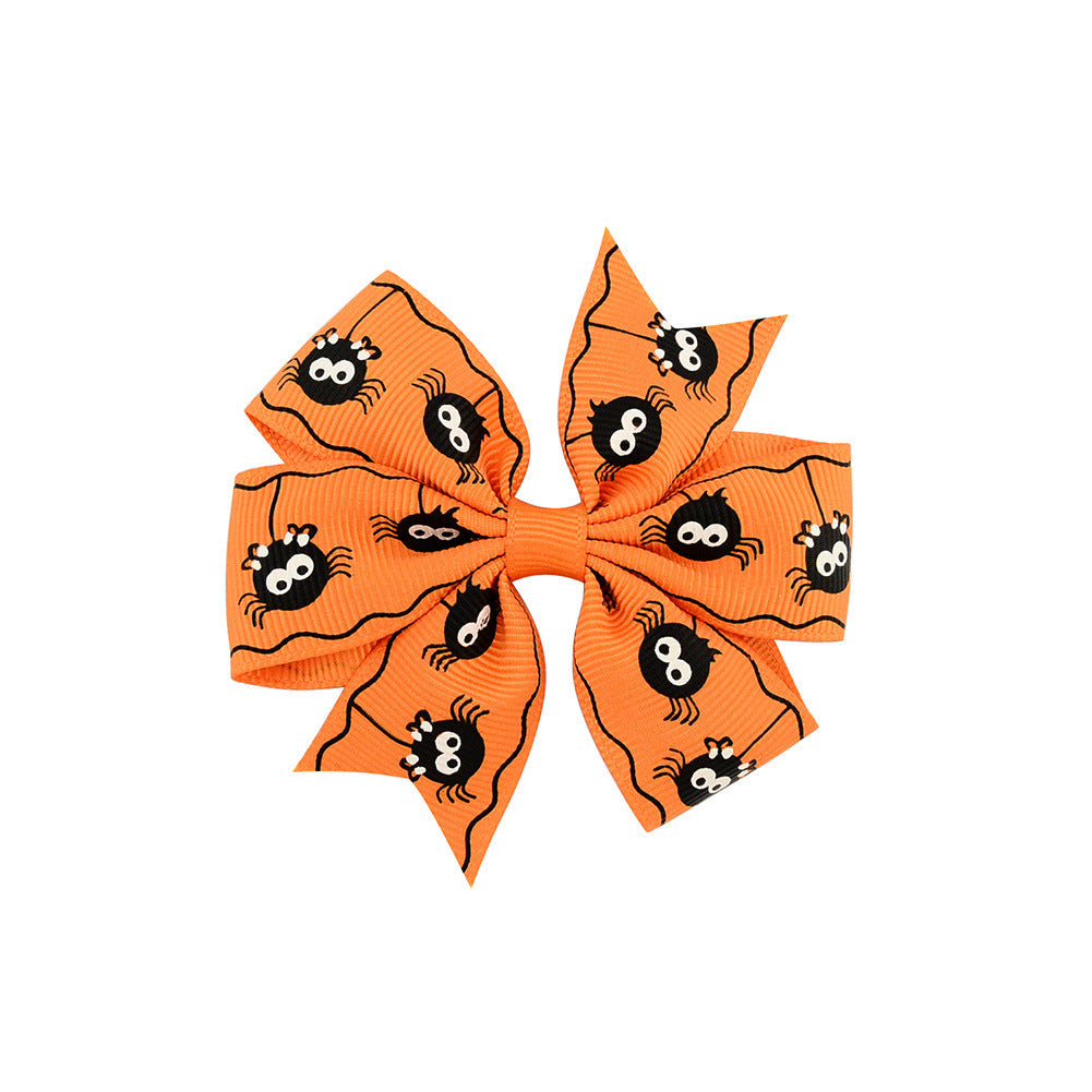 Halloween Schleife mit Kürbis- und Hexen-Motiven