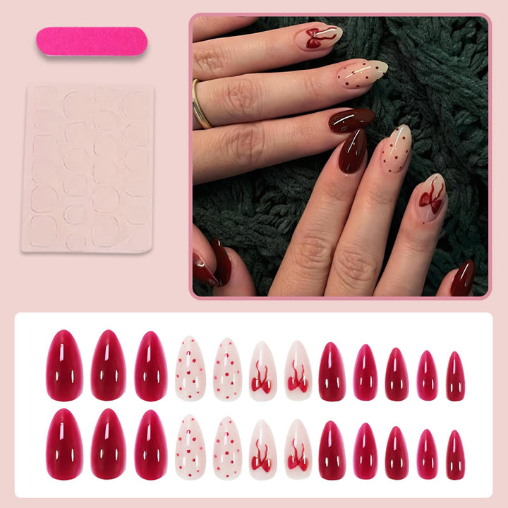Kunstnagelset mit stilvollen Frucht- und Pluster-Designs Karnz
