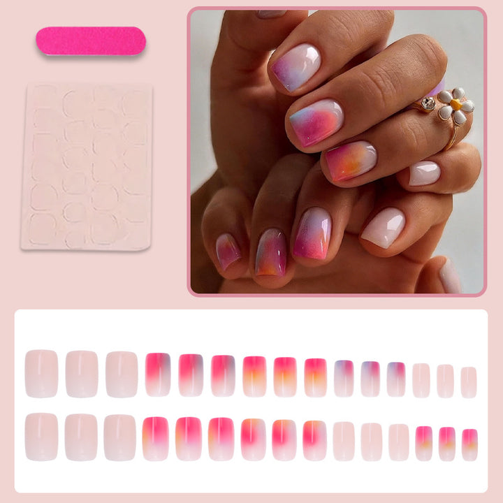 Kunstnagelset mit elegantem Farbverlauf und glitzernden Akzenten Karnz