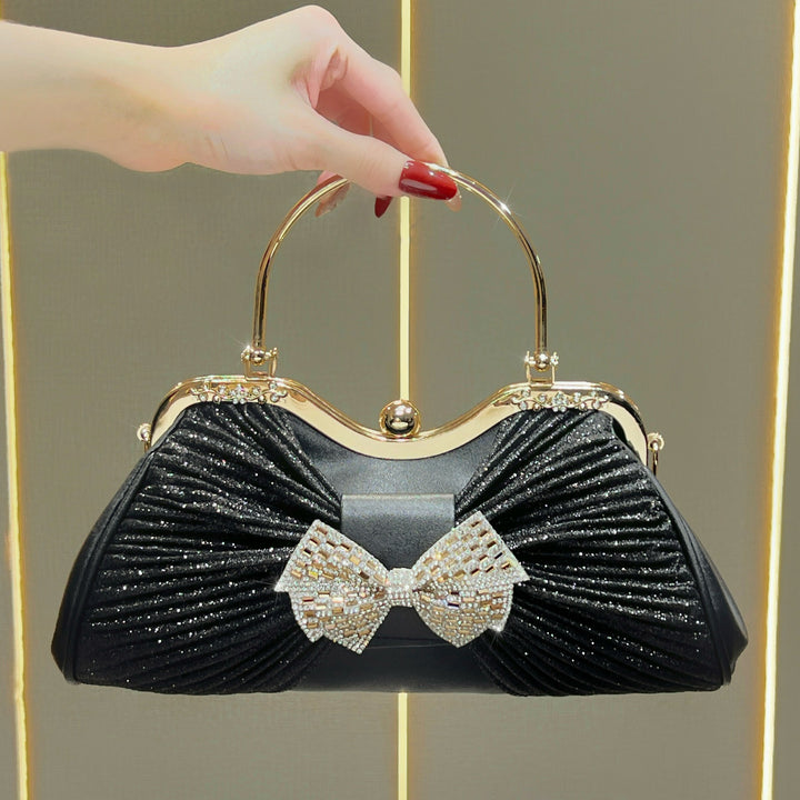 Vintage-inspirierte Abendtasche mit Schleifenakzent