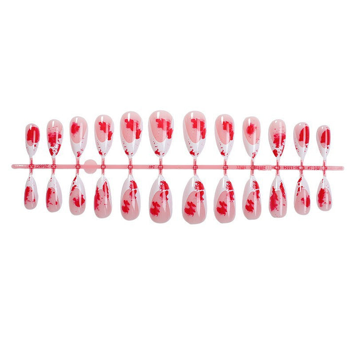 Künstlerisches Press-On Nagelset mit floralem Design Karnz