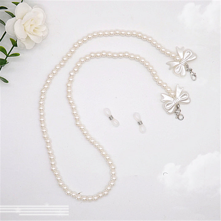 Elegante Perlen-Brillenkette mit Schleifenanhängern Karnz