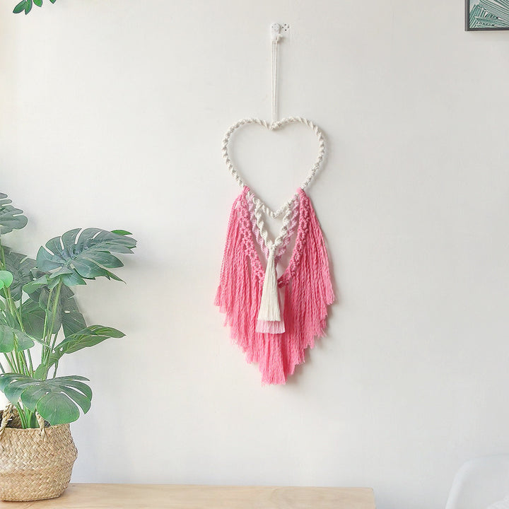 Dekorative Makramee Wandbehang mit Herzdesign