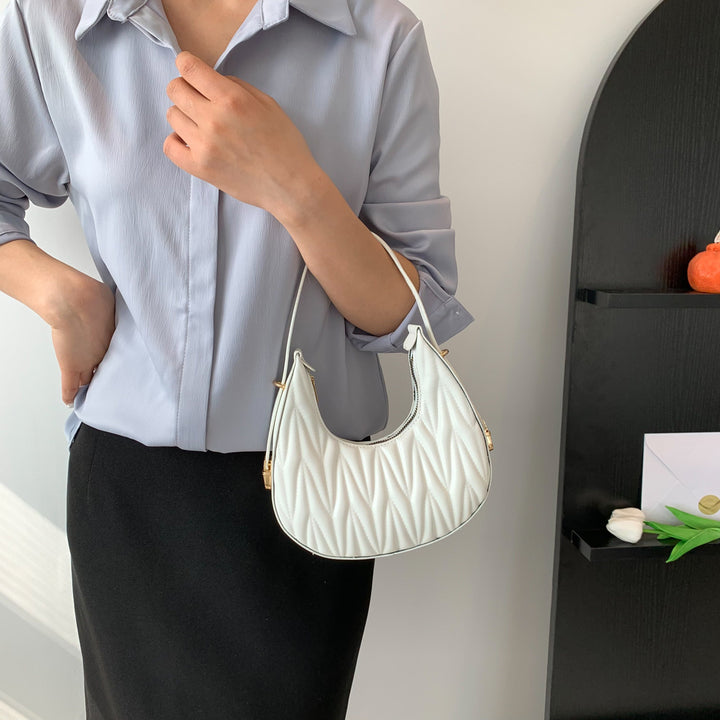 Gepolsterte Mini-Handtasche