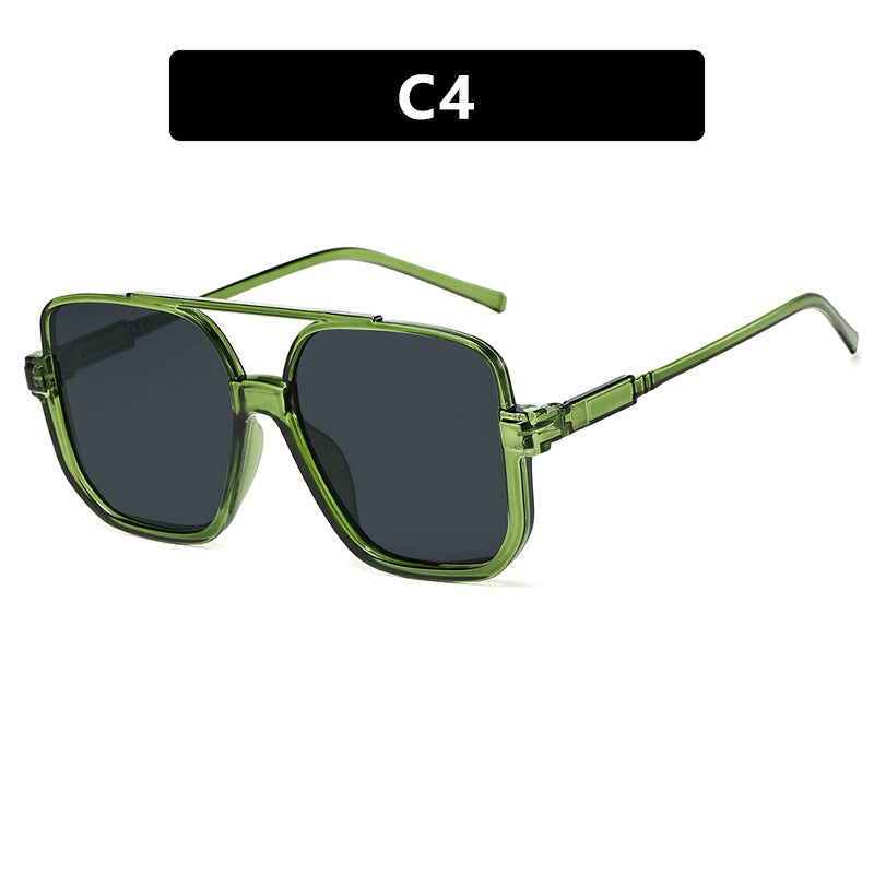Damen quadratische Sonnenbrille mit transparentem Rahmen und grün getönten Gläsern Karnz