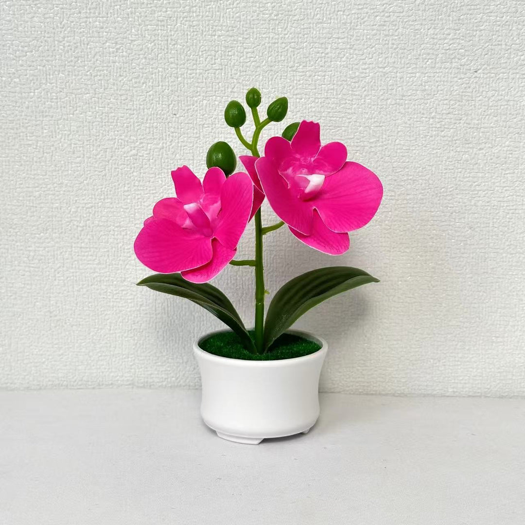Elegante künstliche Orchideenpflanzenanordnung für die Innendekoration