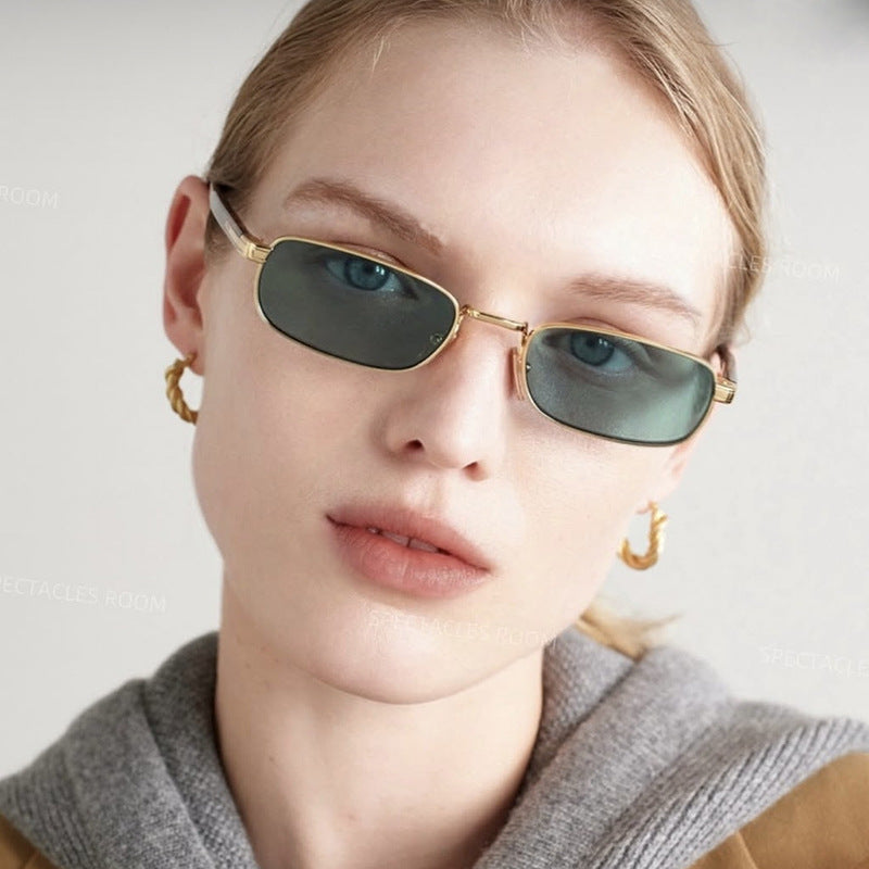 Damen modische Sonnenbrille mit stilvollem Metallrahmen und orangefarbenen Gläsern Karnz