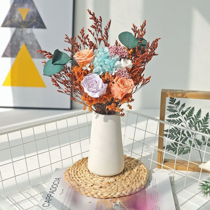 Elegante dekorative Schein- Blumenanordnung