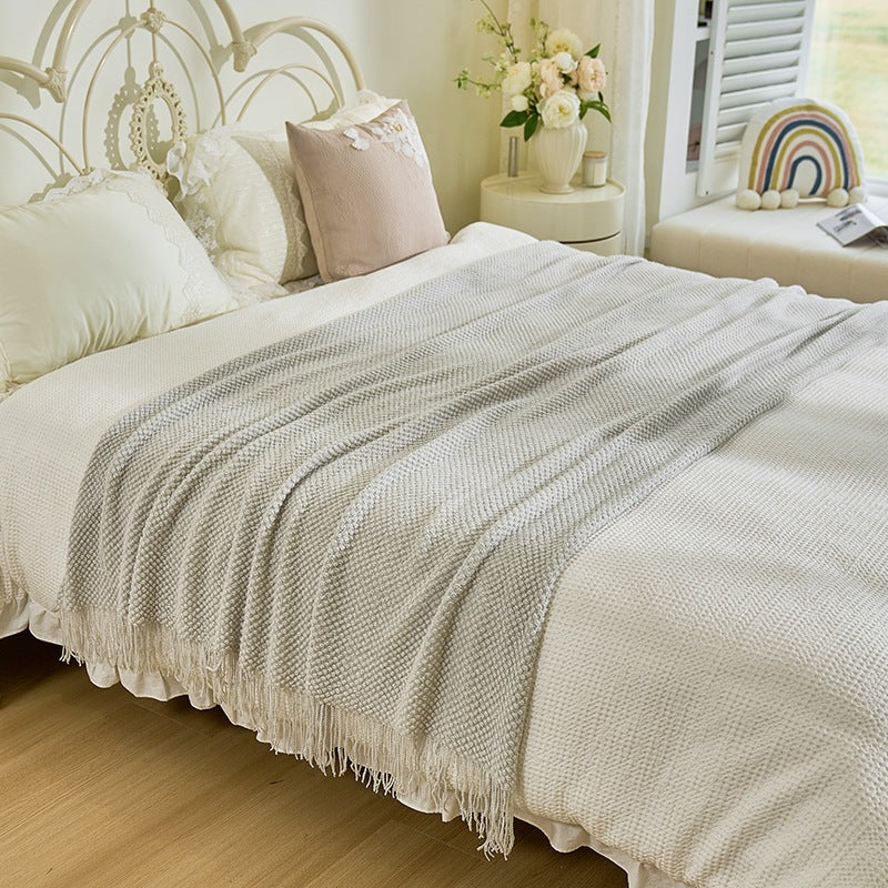 Strukturierte Strickwurfdecke