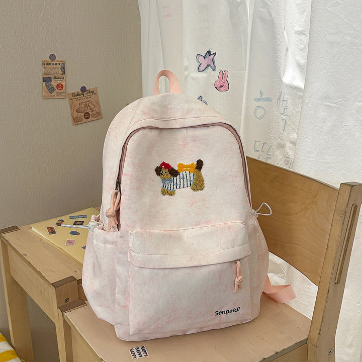 Verspielt bestickter Rucksack