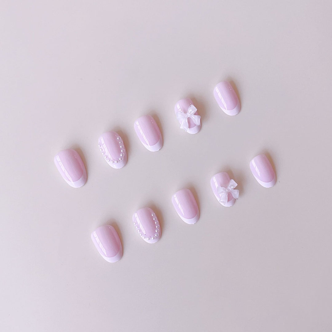 Kunstnagelset mit eleganten 3D-Blüten- und Spitzenakzenten Karnz