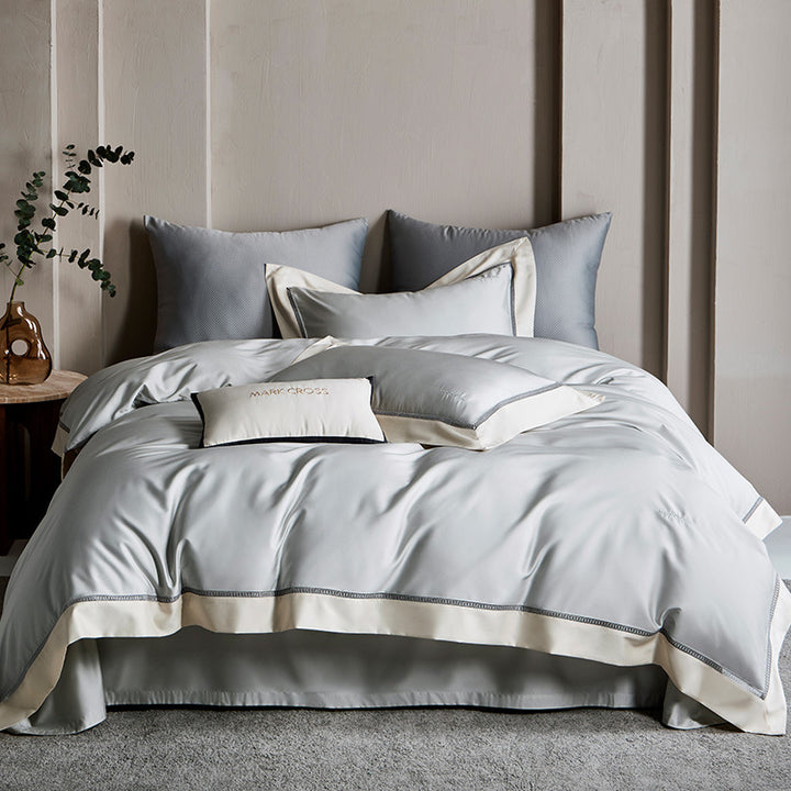 Elegantes Satin-Duvetbezug-Set mit kontrastierender Saumblende und feiner Biese