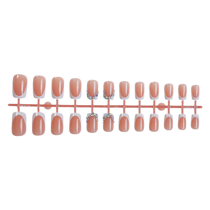 Dekorativer French Tip Press-On Nagelset mit Strass-Akzenten Karnz