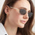 Damen stilvolle ovale Sonnenbrille mit eleganten Verzierungen Karnz