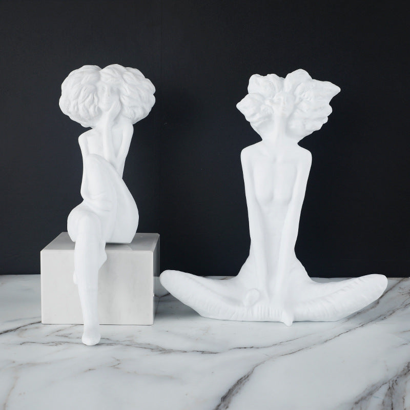 Künstlerische figurative Heimskulptur