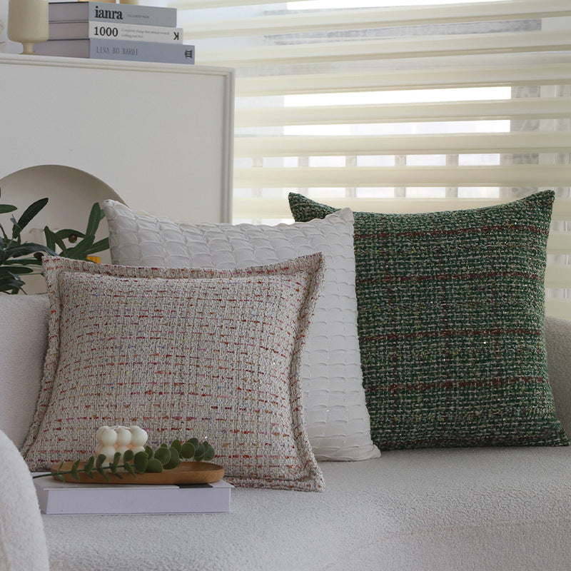 Quadratischer Bouclé-Kissenbezug im Tweedstil mit dezentem Multicolor‑Tufting Karnz