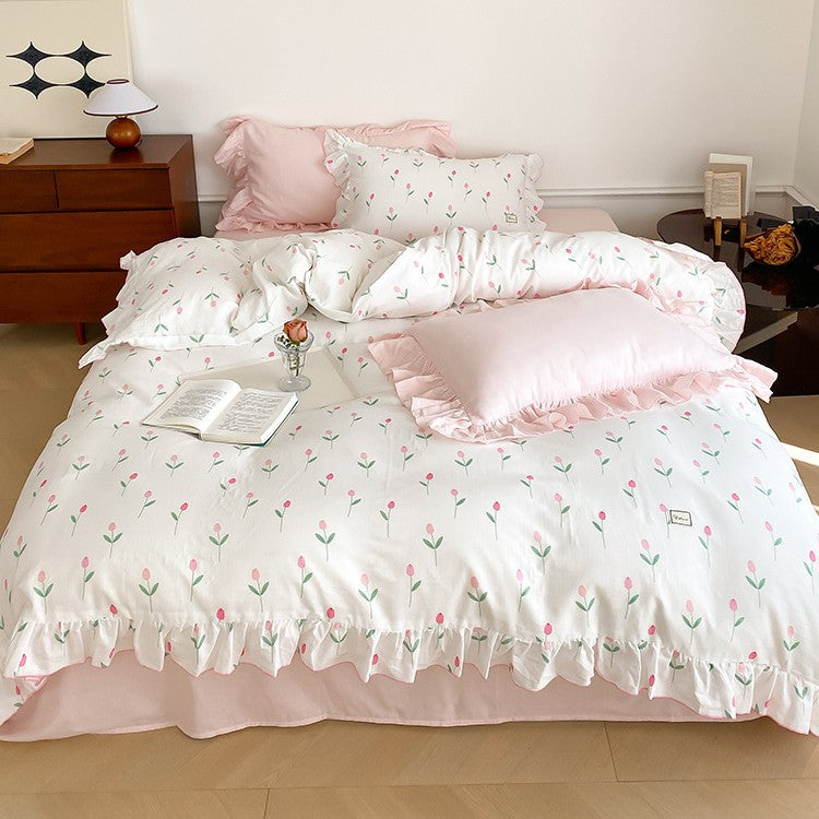 Baumwoll-Bettwäscheset mit zartem Blumenmuster und dekorativem Volant