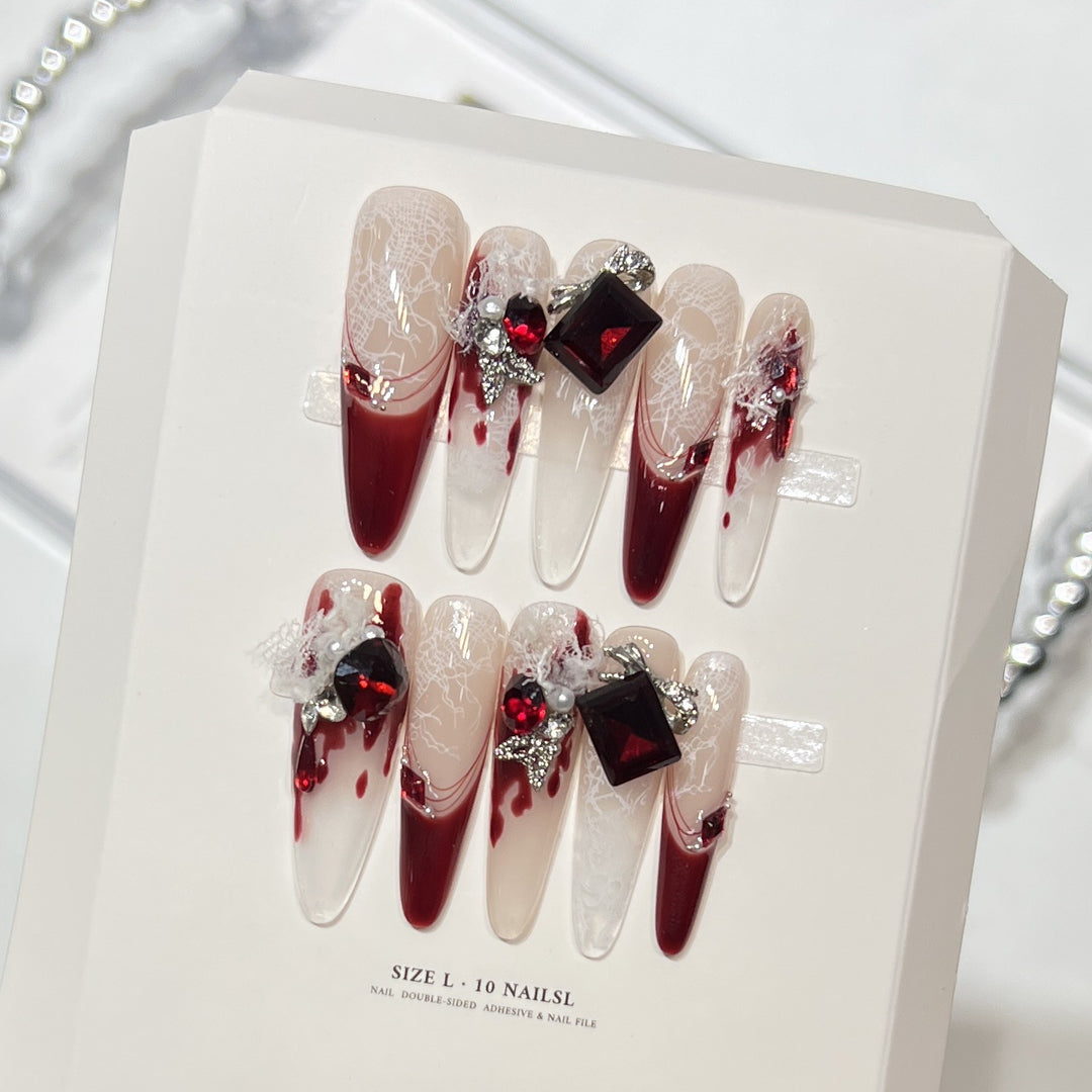 Elegantes Press-On-Nagelset mit künstlerischen Edelsteinakzenten