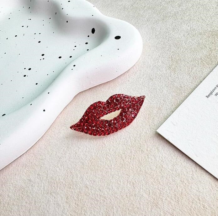 Glitzernde Lippenbrosche Karnz