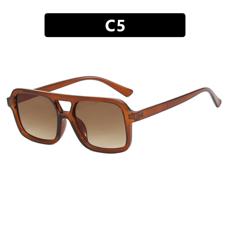 Damen moderne quadratische Sonnenbrille mit schützendem UV-Filter und transparentem Rahmen Karnz