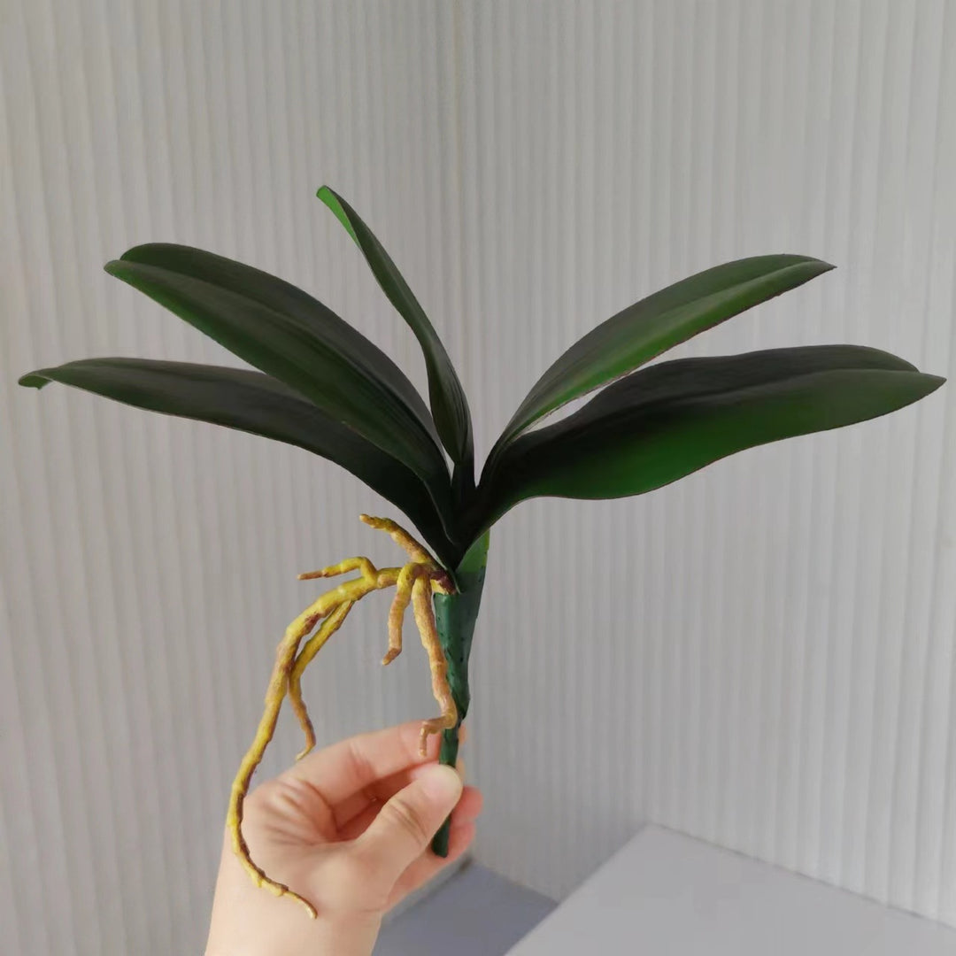 Realistische Orchideenblatt-Anordnung