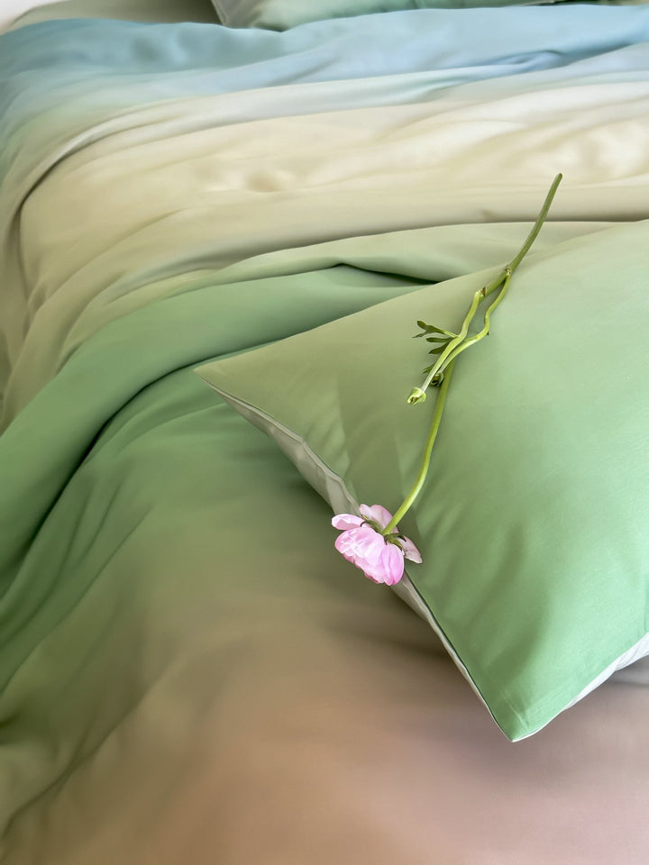 Bettwäsche-Set aus Satin mit sanftem Ombre-Farbverlauf und seidig-mattem Griff