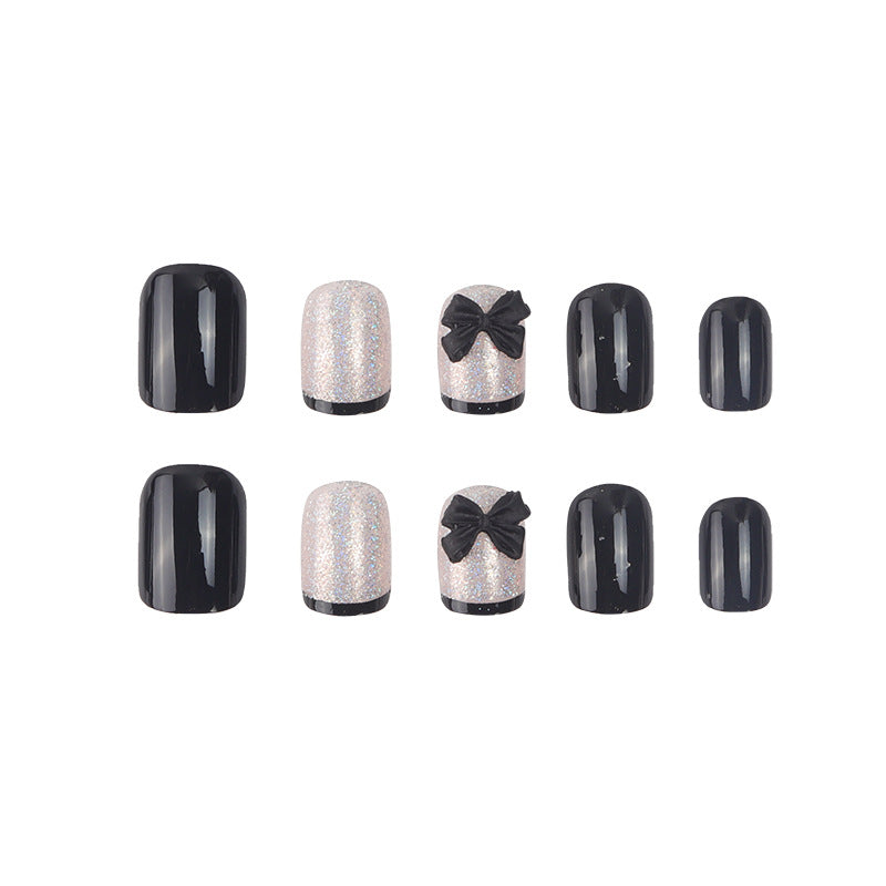 Elegante Stiletto Press-On Nail Set mit dekorativen Schleifenakzenten Karnz