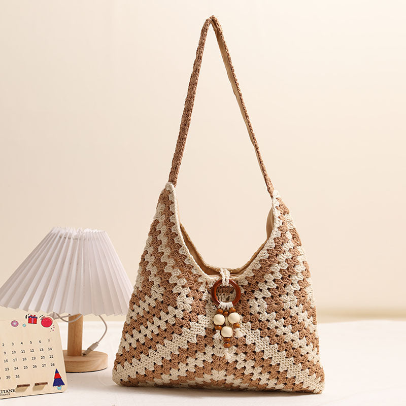 Damen Handtasche mit kunstvollem Flechtmuster Karnz