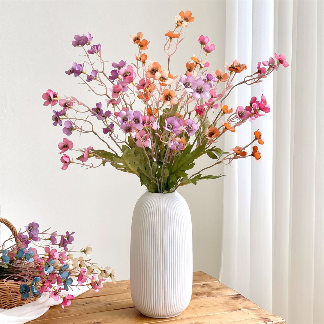 Dekorativer künstlicher Blumenzweig