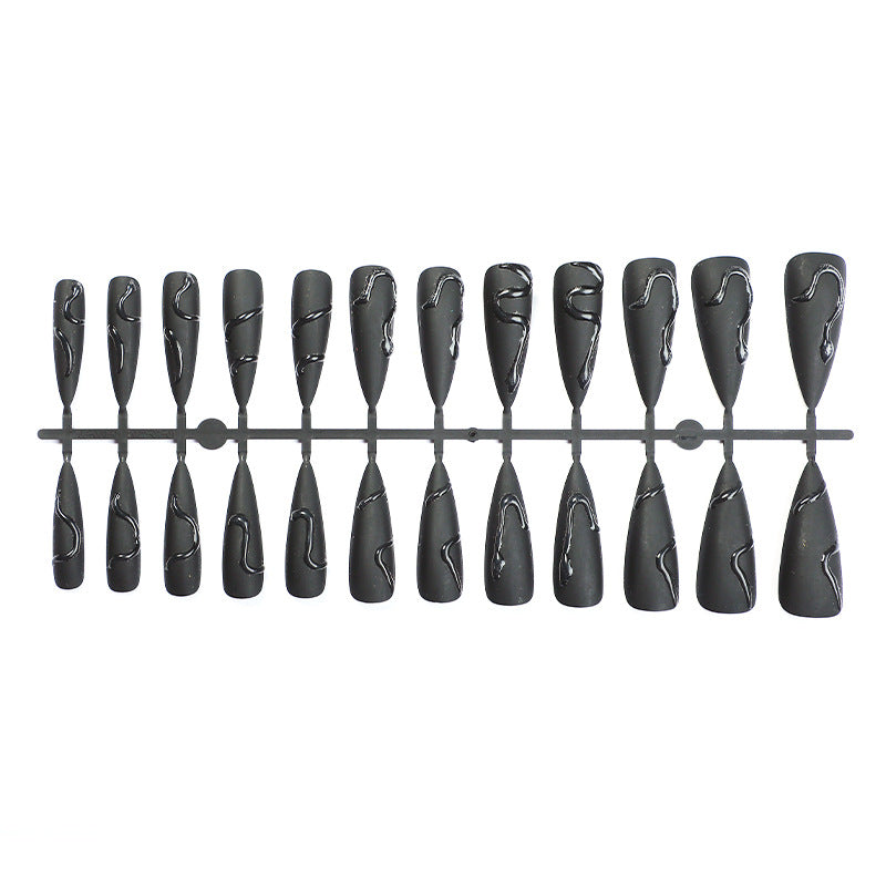 Künstlerisches Stiletto-Nageldesign Karnz