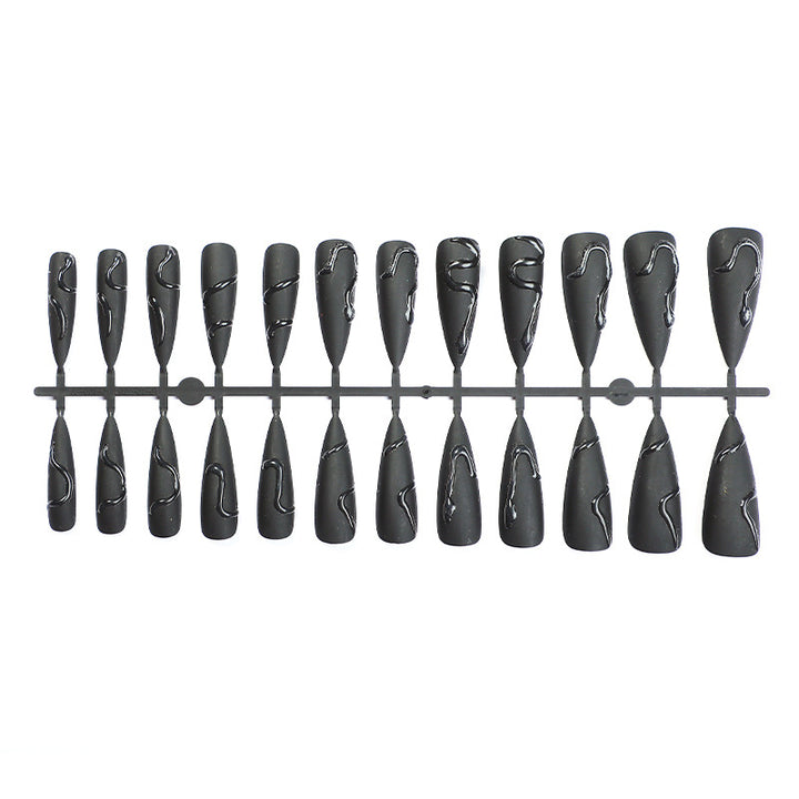 Künstlerisches Stiletto-Nageldesign Karnz