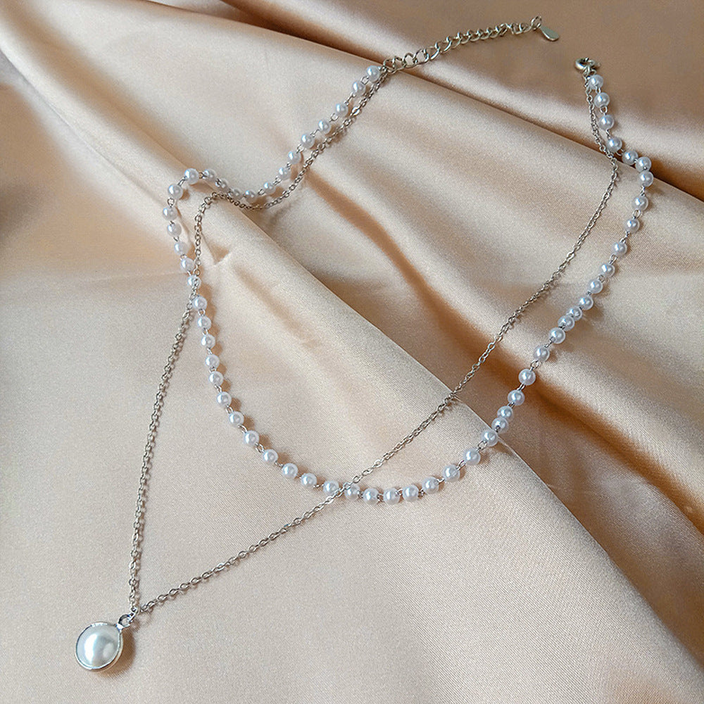 Elegante geschichtete Perlenkette Karnz