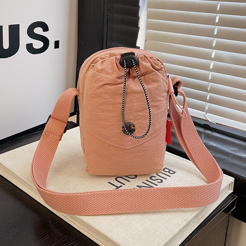 WoCompact Drawstring Crossbody Bag Karnz