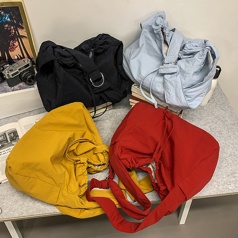 Leichtgewichtige Kordelzug Schultertasche Karnz
