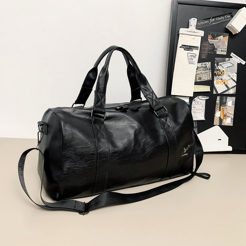 Elegante Woven Leather Duffle Bag