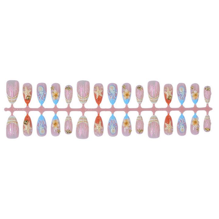 Festliches Kunstnagelset mit maritimen und floralen Designs Karnz