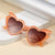 Damen Herzförmige Sonnenbrille im innovativen Design Karnz