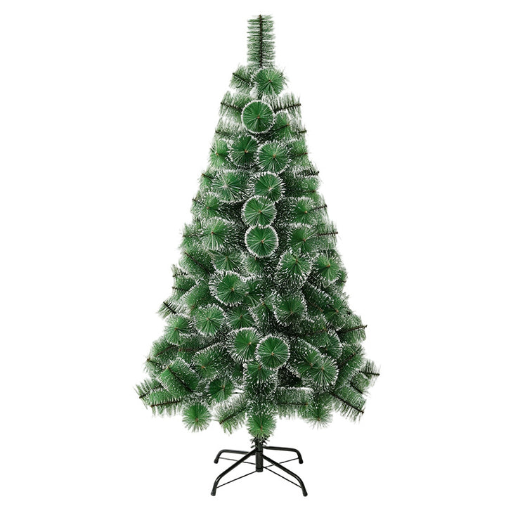 Künstlicher Schnee-bedeckter Weihnachtsbaum